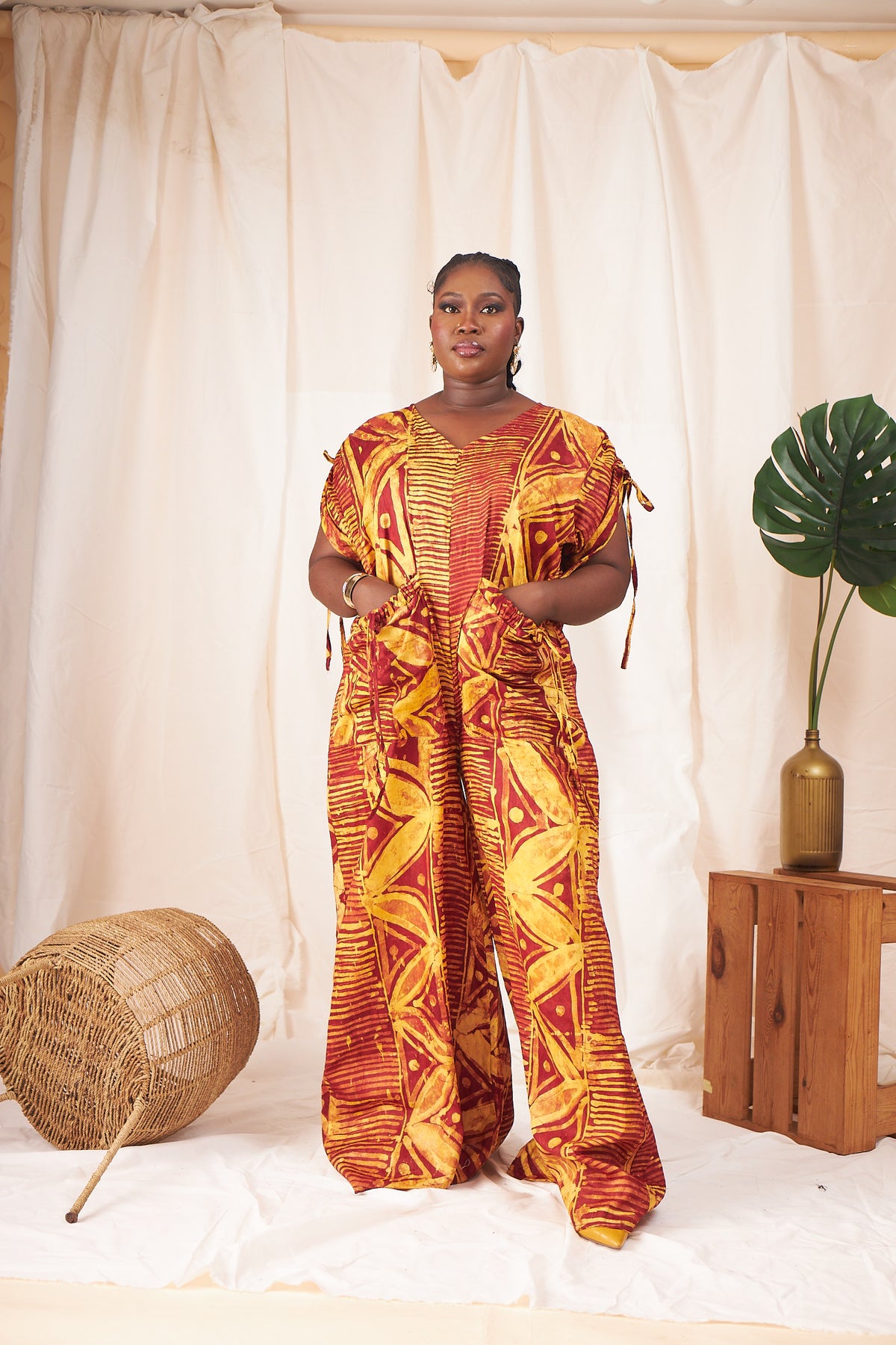Ama Batik Wide-Leg Jumpsuit – Rust & Gold